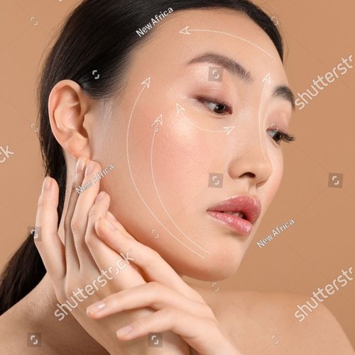 Woman touching her cheek